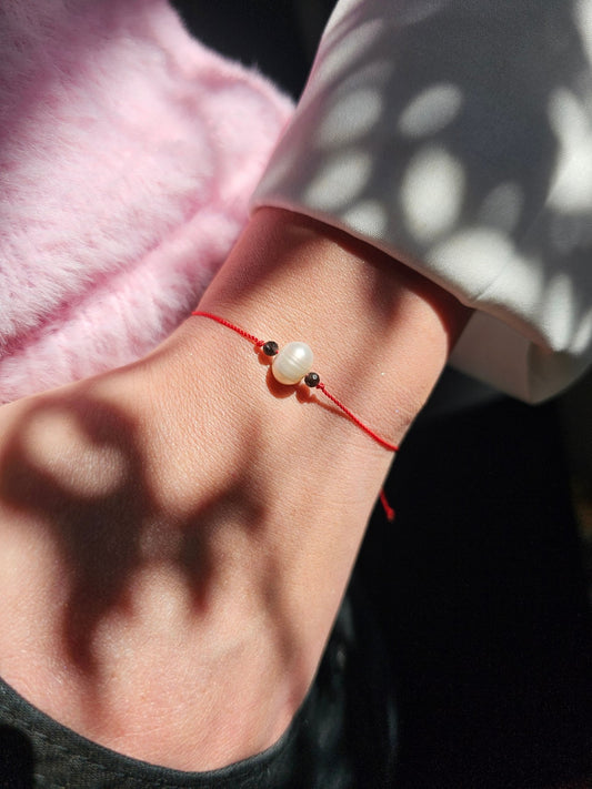 Handmade Lucky Bracelet for Women with Freshwater Pearls and Black Obsidian. Spiritual energy jewellery for protection, emotional healing and balance. Perfect boho gift, adjustable and made in Ireland.