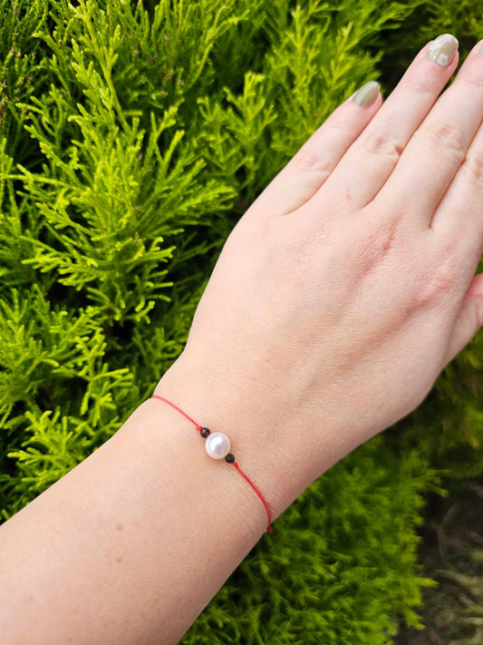 Handmade Lucky Bracelet for Women with Freshwater Pearls and Black Obsidian. Spiritual energy jewellery for protection, emotional healing and balance. Perfect boho gift, adjustable and made in Ireland.