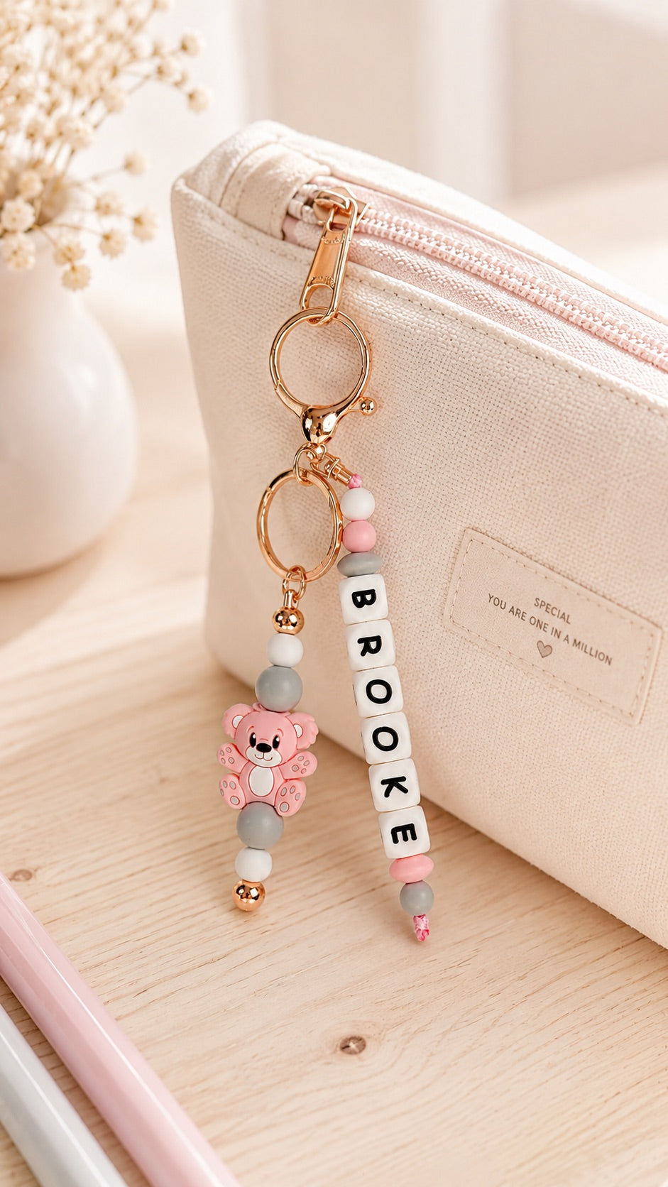 Personalised pastel silicone bag charm with teddy bear and name beads
