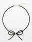 Handmade black tourmaline choker necklace with a delicate beaded bow and 925 sterling silver finish.