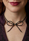 Handmade black tourmaline choker necklace with a delicate beaded bow and 925 sterling silver finish.