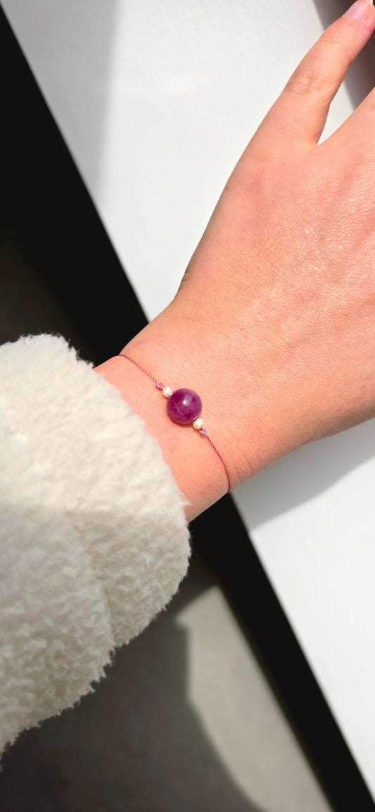 Amethyst lucky thread bracelet with 8mm natural gemstone and two 925 sterling silver diamond-cut beads on violet string.