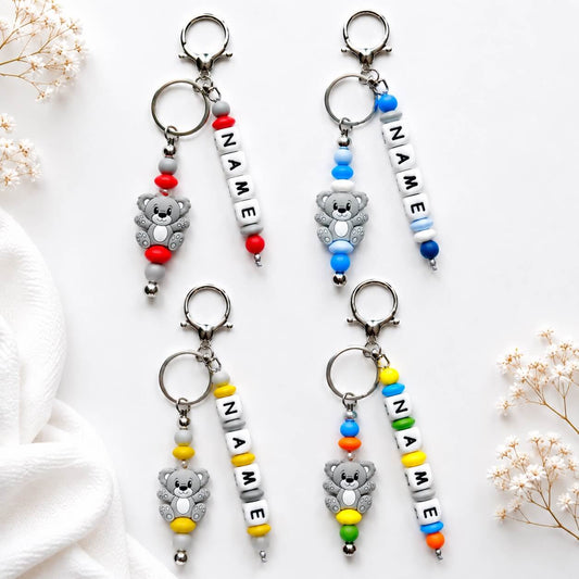 Personalised colourful silicone name charm for nappy bags, backpacks and keys
