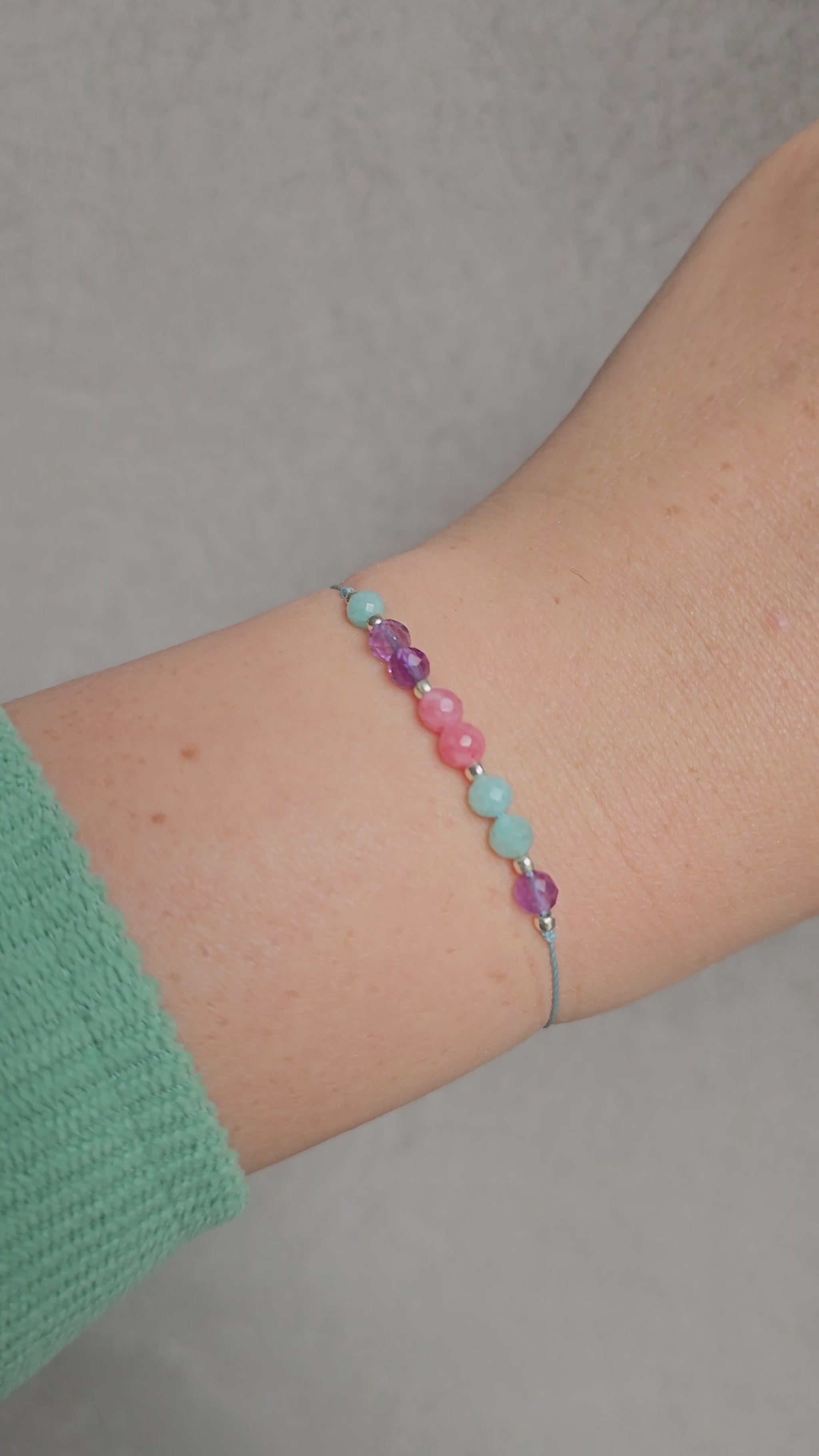 Adjustable bracelet with amazonite, amethyst, and pink chalcedony gemstones, silver Toho beads – handmade Irish jewellery
Close-up of handmade gemstone bracelet with sterling silver Toho beads and adjustable cord
Elegant adjustable bracelet featuring amazonite, amethyst & pink chalcedony beads, sterling silver accents
